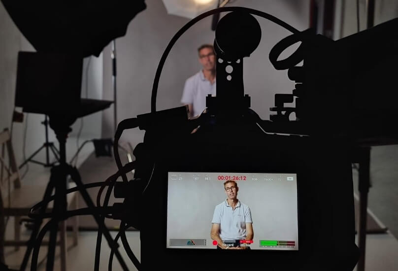 Person on camera screen